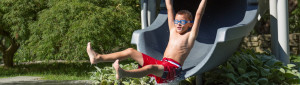 kid on water slide